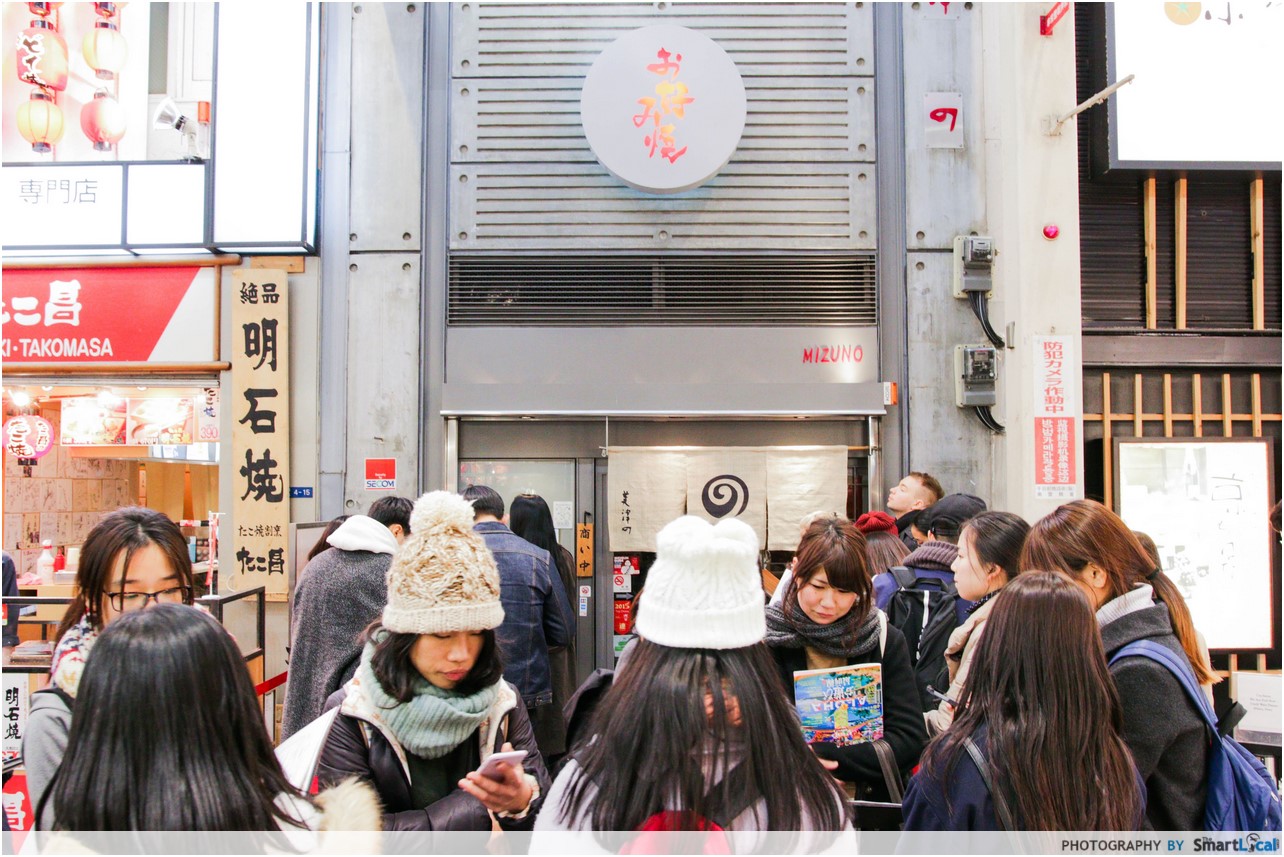 The Smart Local - Japanese queuing for Dotonburi's famous takoyakis