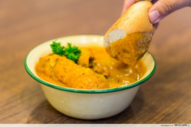 dip crispy loaf into curry