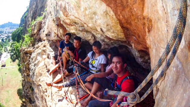 take a break in a small cave while climbing