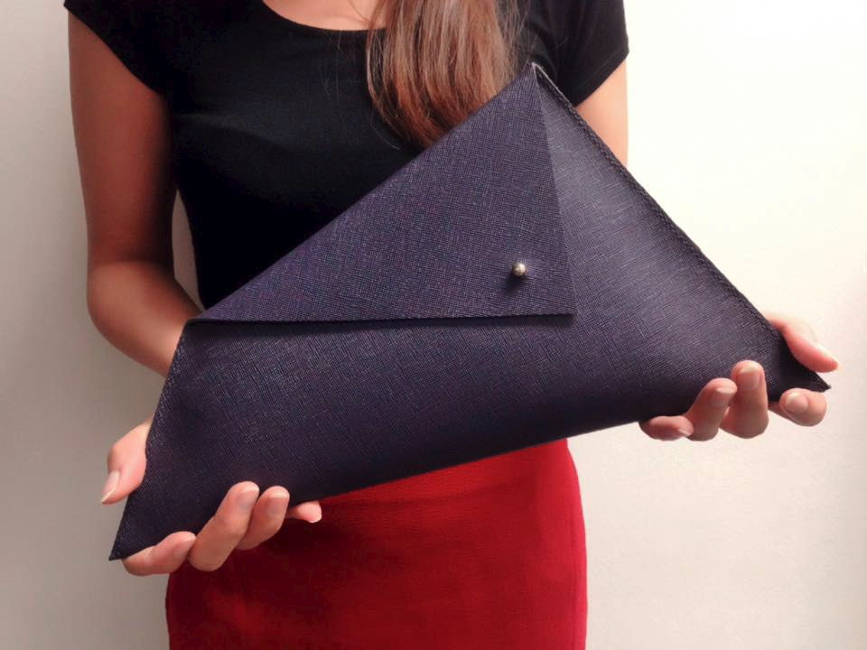 one+one's trapezoid-shaped handbag