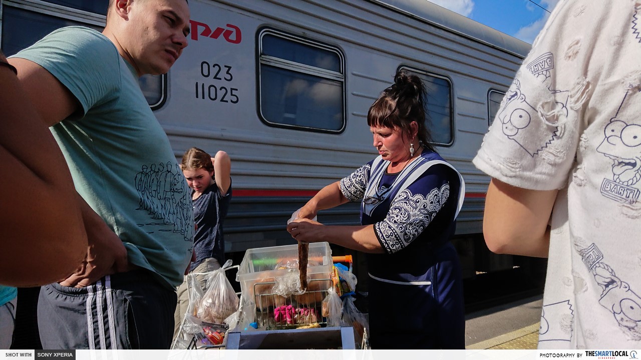 russian food vendors at the railway station trans manchurian train