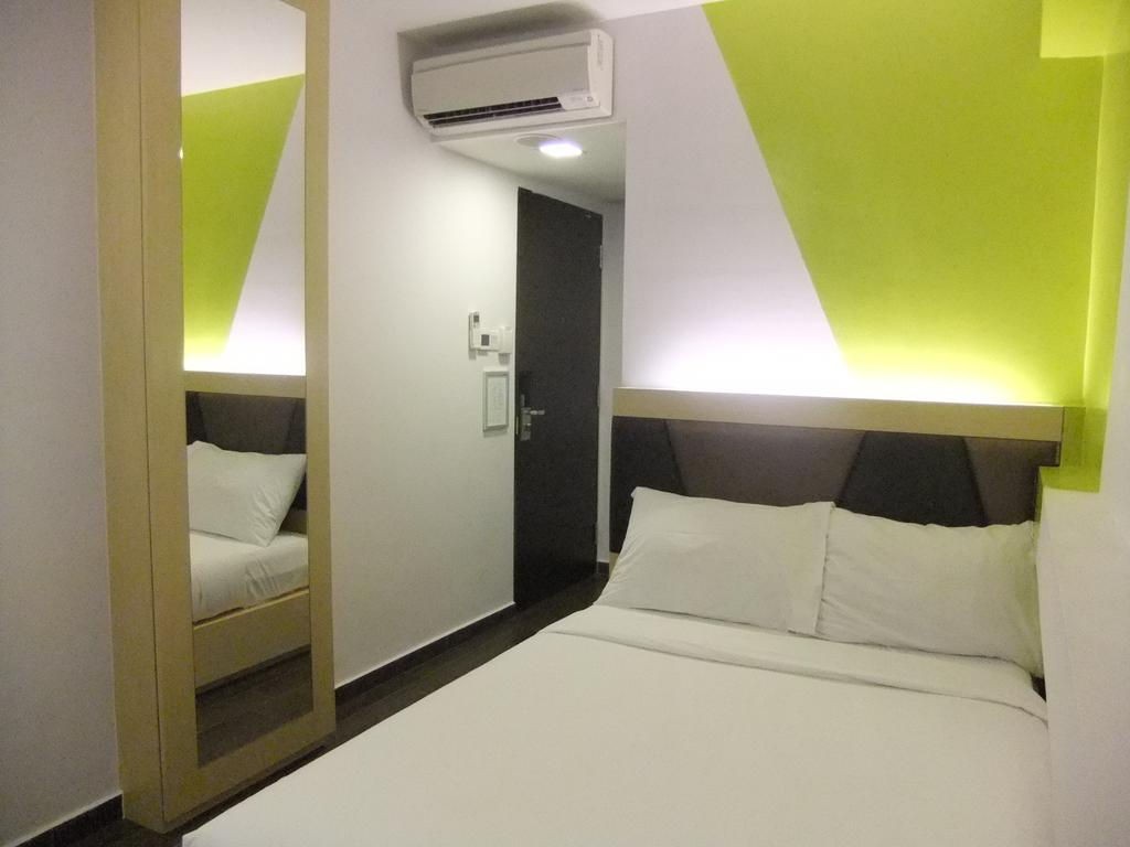 Hotels near clubs - simply furnished room