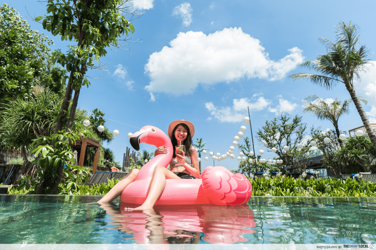 hotel indigo bali - flamingo float on main pool