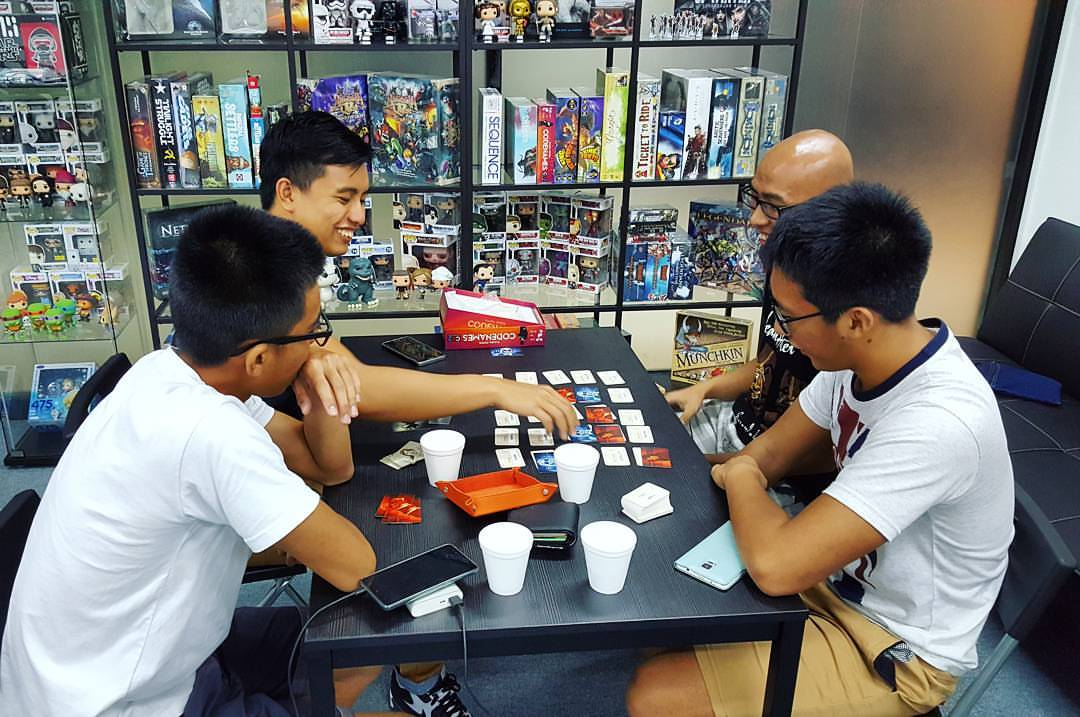friends at team board game