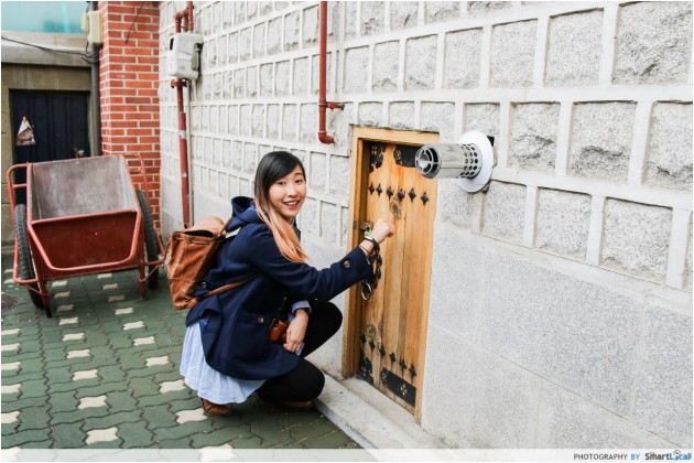 The Smart Local - Kimberly exploring the doors mainly used for servants in a traditional Hanok