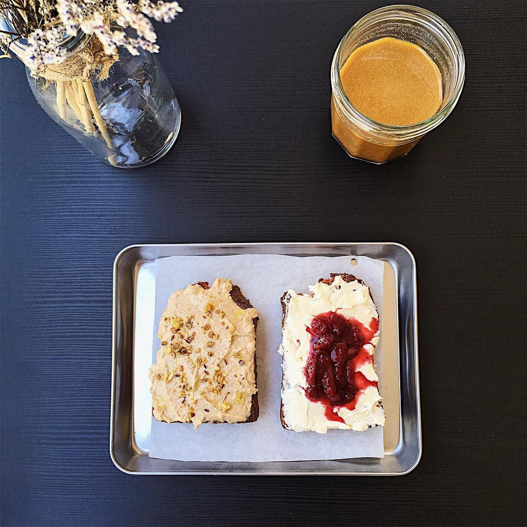 The Bakery's Nut Butter Honey and Sea Salt Toast, and Sage Cream Cheese and Berry Compote Toast