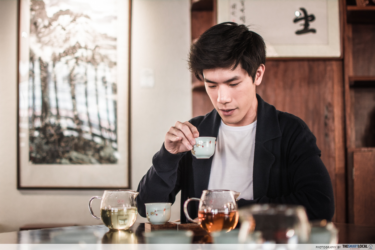 guo xin shu fan drinking tea
