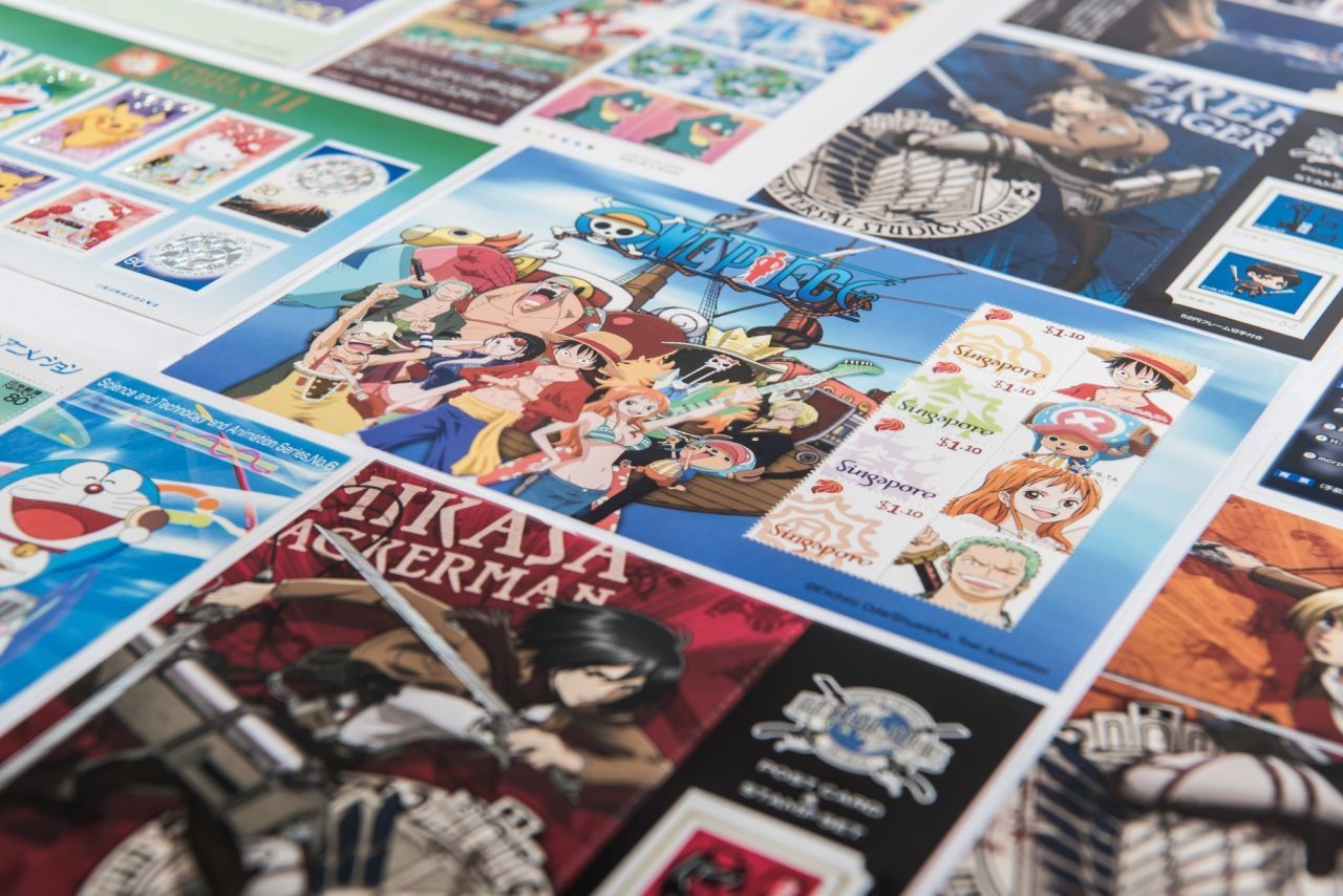 Admire stamps with designs of cartoons like Pokemon and Totoro