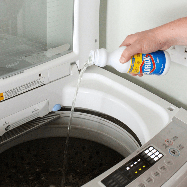 Moldy washing machine smell - bleach + warm water
