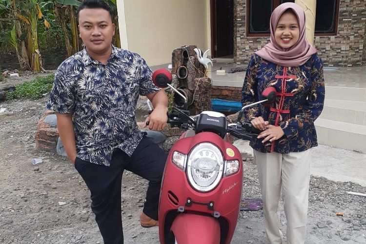 fajar and wife and new motorbike