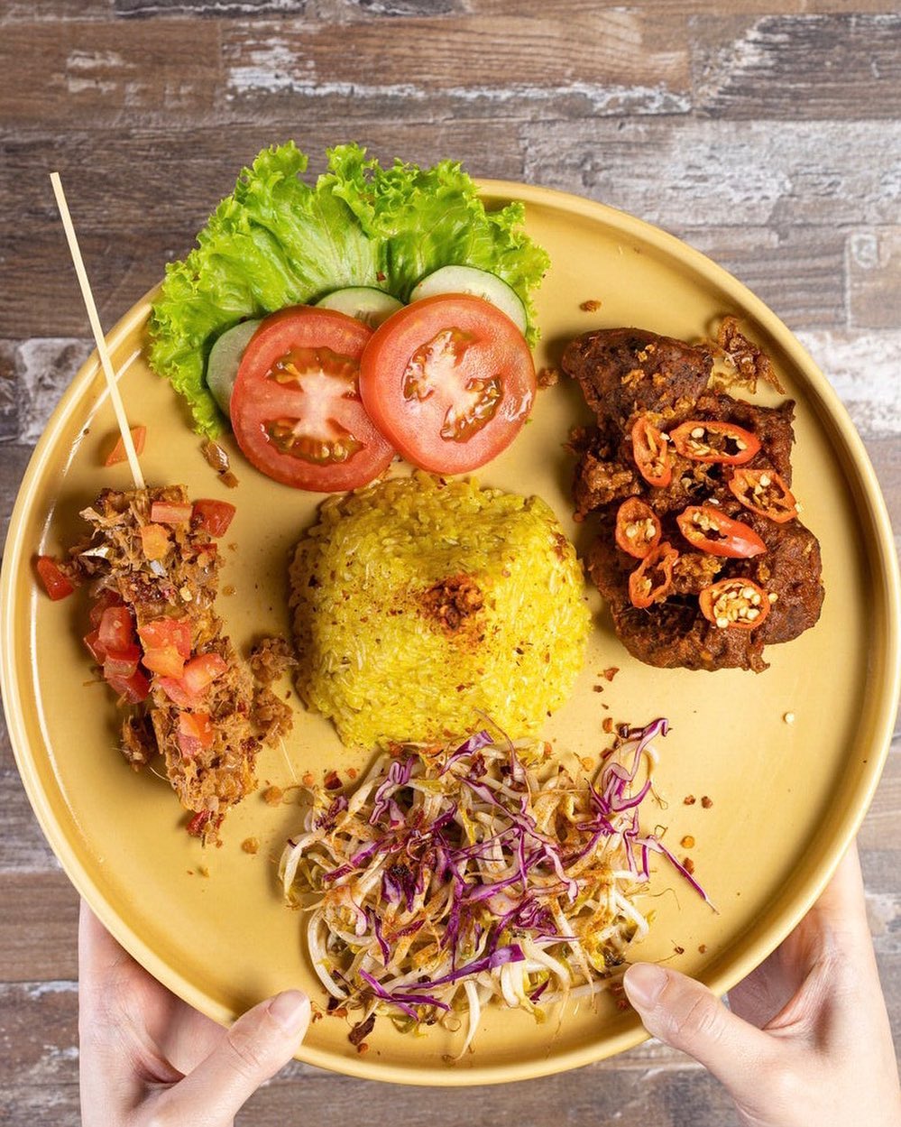 vegan and vegetarian cafes in jakarta - burgreens rendang platter