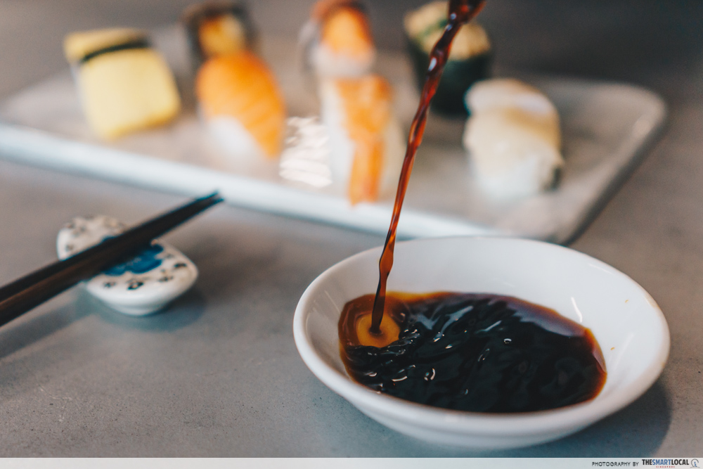 pouring excess soy sauce