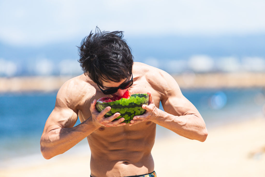 Free shirtless muscular men photos  - muscular men eating watermelon