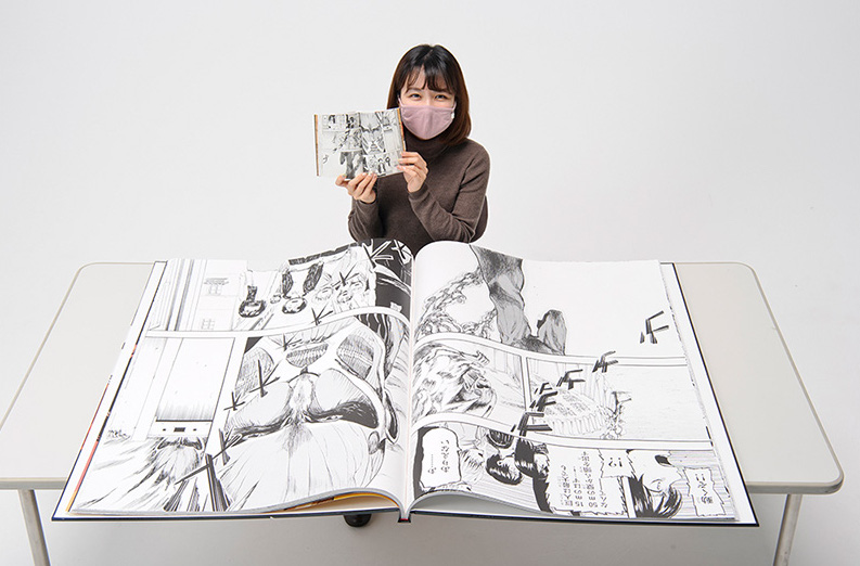 Attack On Titan colossal manga - opened manga copy