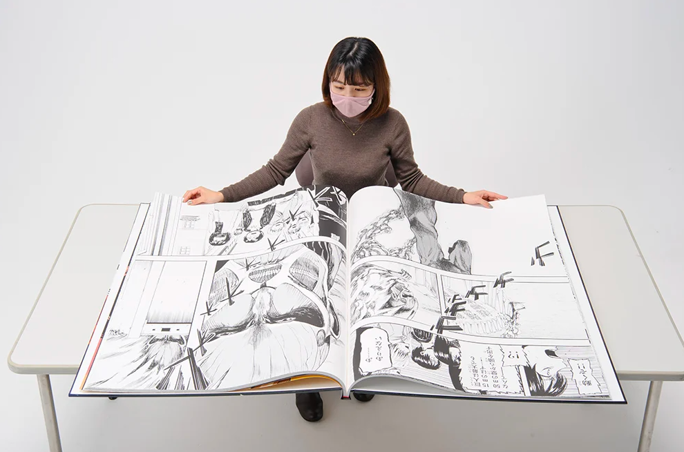 Attack On Titan colossal manga - opened manga copy