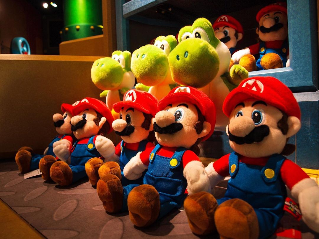 Row of Mario and Yoshi plushies 