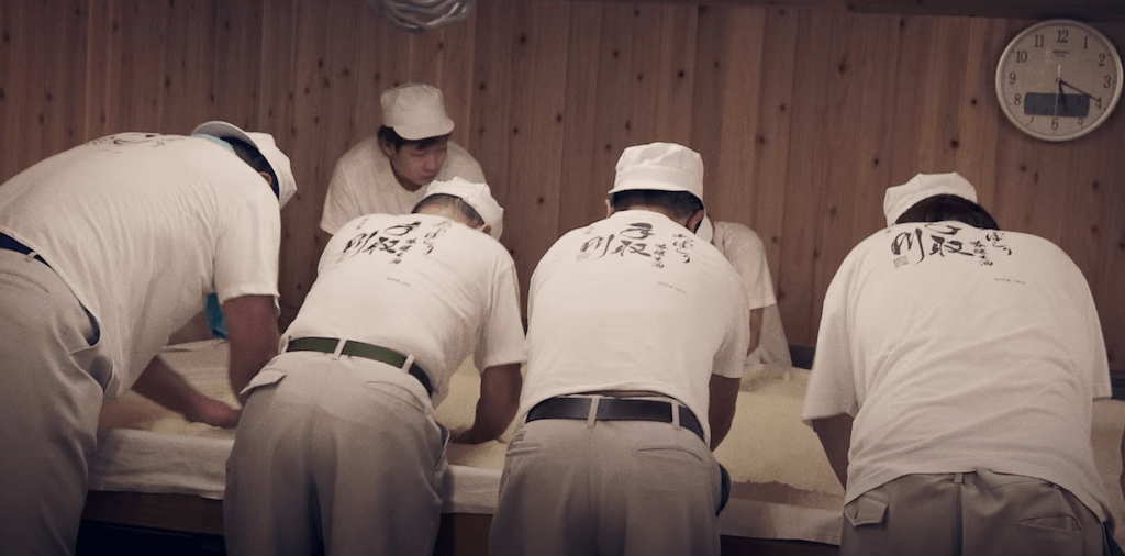 Brewers making sake