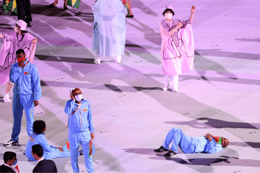 Tokyo Olympics Opening Ceremony - staff cheering