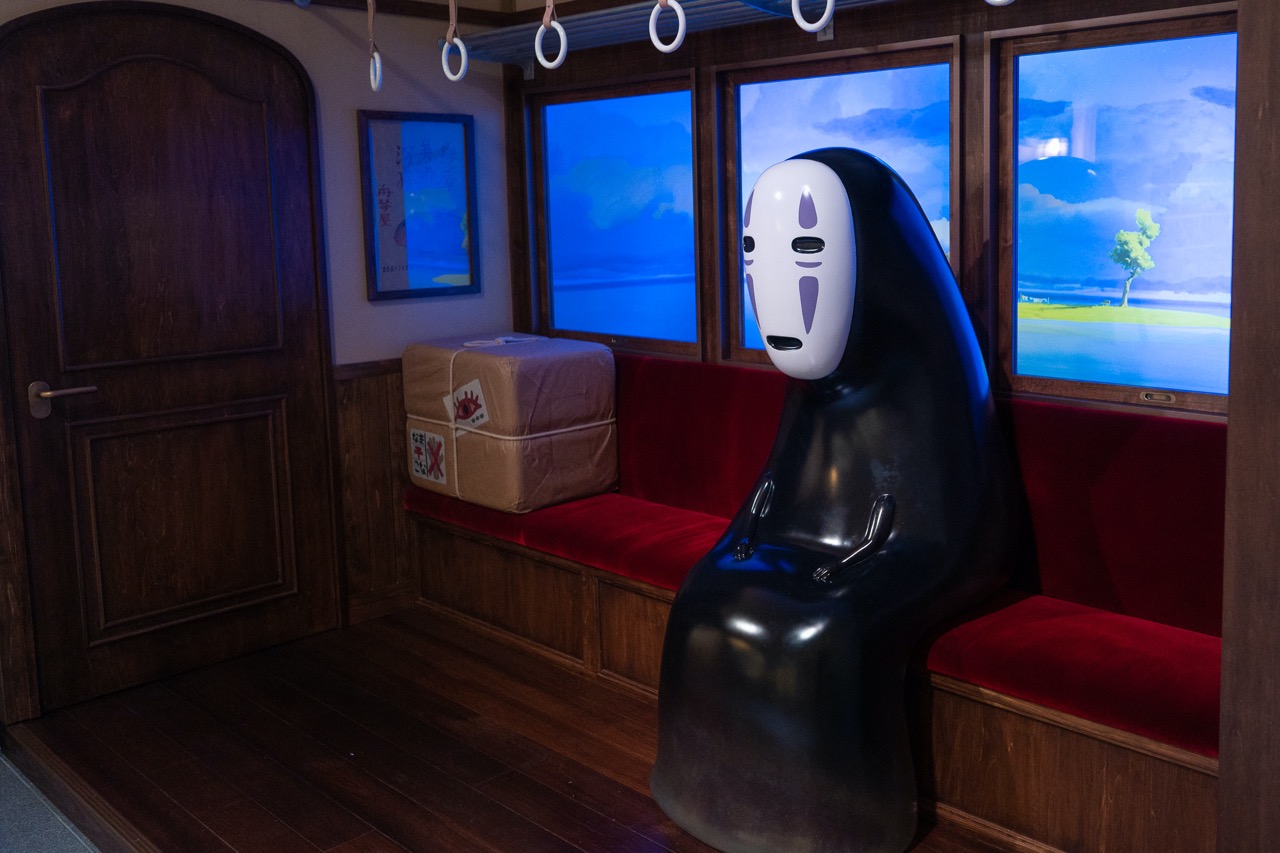 Ghibli Park - train scene from spirited away with no face