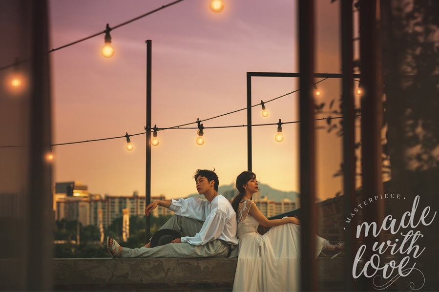 korean wedding photoshoot rooftop shot of couple