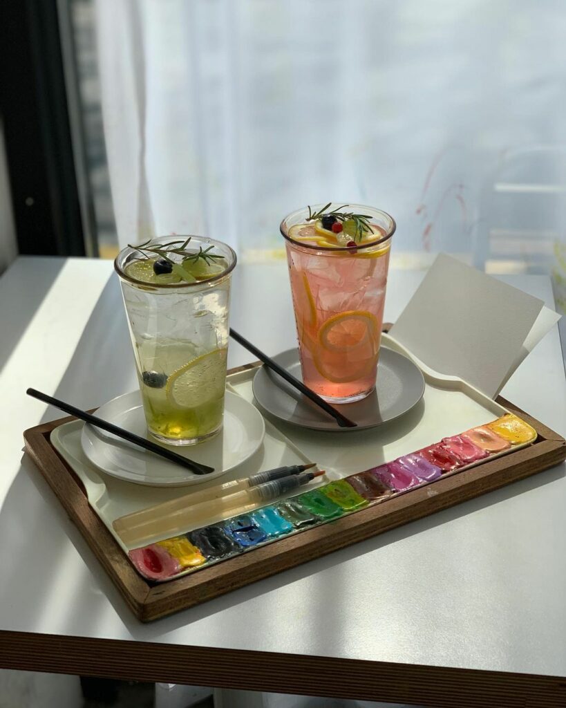 two ades on a watercolour palette tray