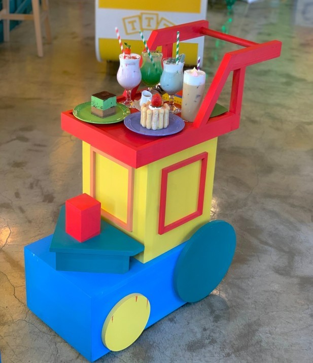 full view of trolley with desserts