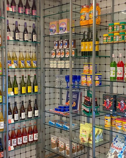Dalmatian - wall display of wine bottles and other Western snacks