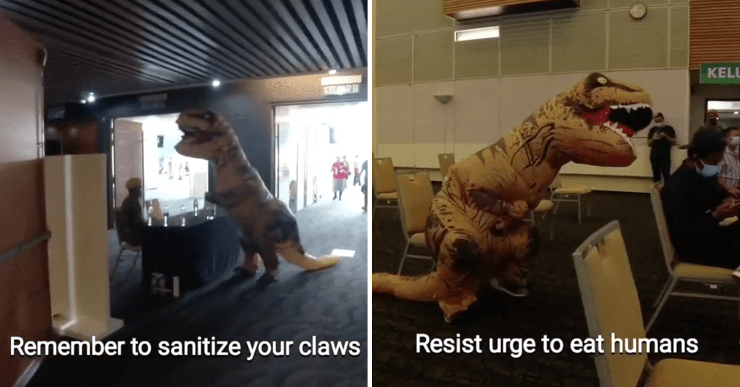 Malaysians wear costumes to vaccination - Dinosaur