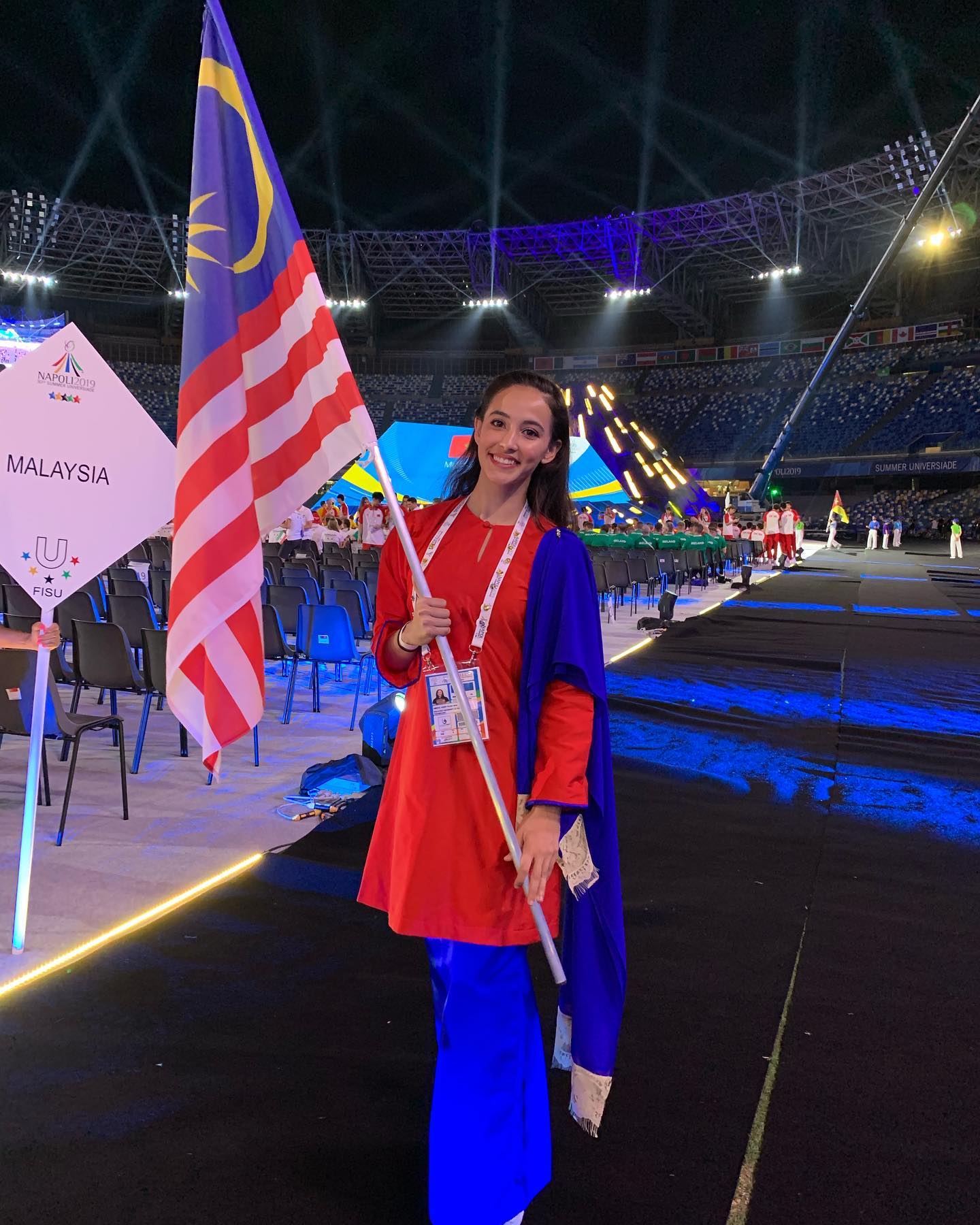 Farah holding Malaysian flag