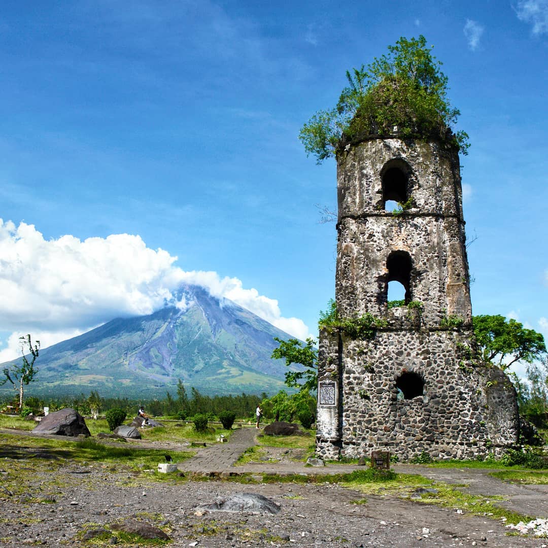 Bell Tower of Cagsawa Church guarding Mayon Volcano