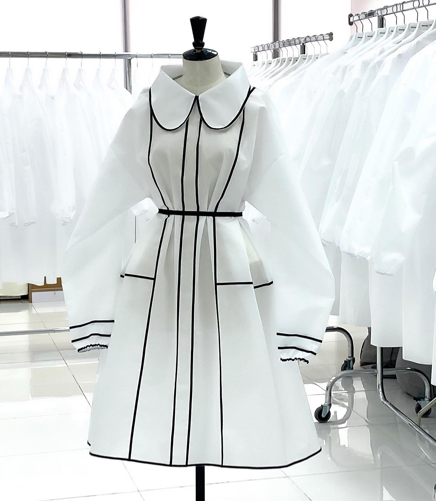 Michael Cinco protective lab gown design in black and white