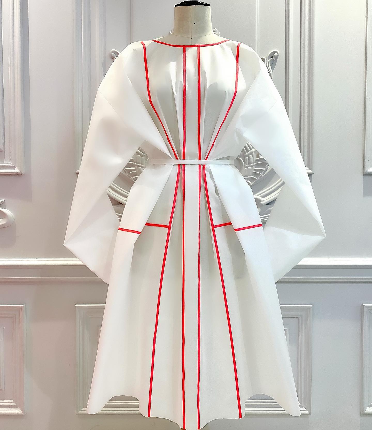 Michael Cinco's protective lab gown in red and white