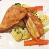 Cordon Bleu Breaded Chicken Stuffed With Ham And Emmental Cheese On Mashed Potatoes And Vegetables