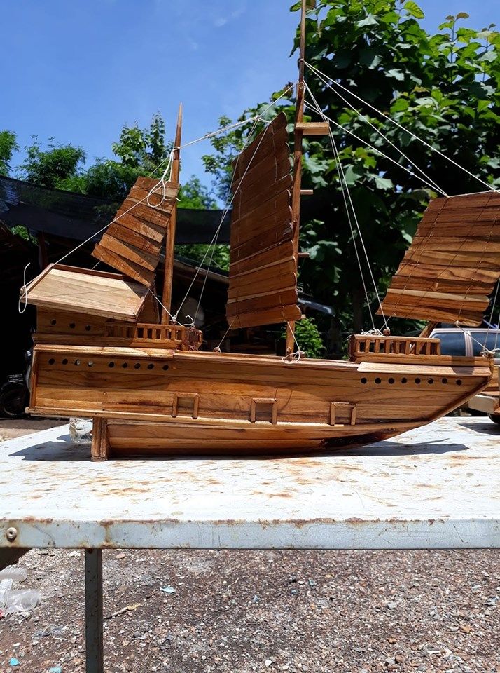 thai uncle make retro wooden boat toy