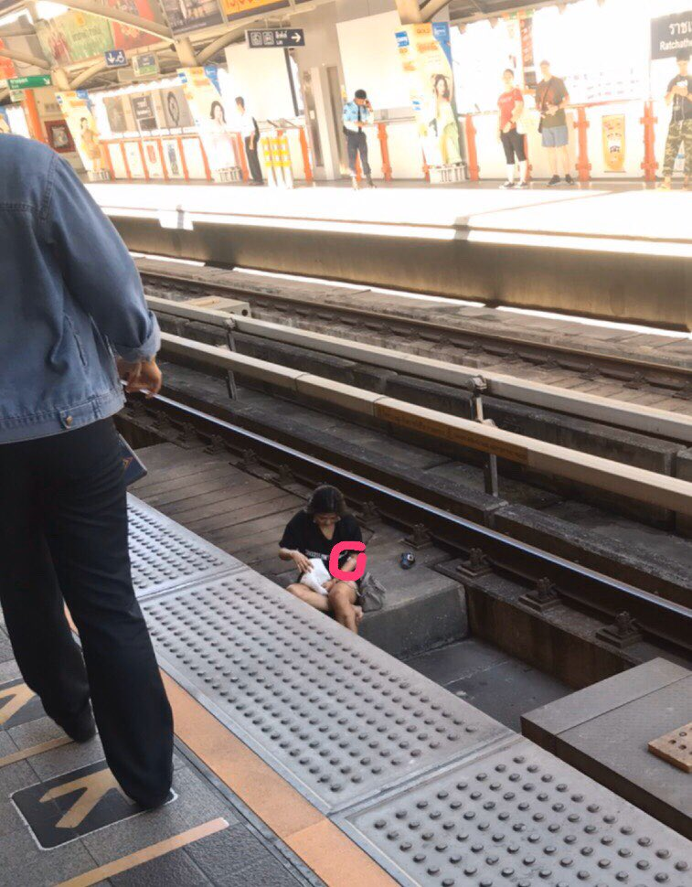 Commuter Accidentally Falls Onto BTS Tracks, Others Frantically Wave At Train To Stop And Save Her Life