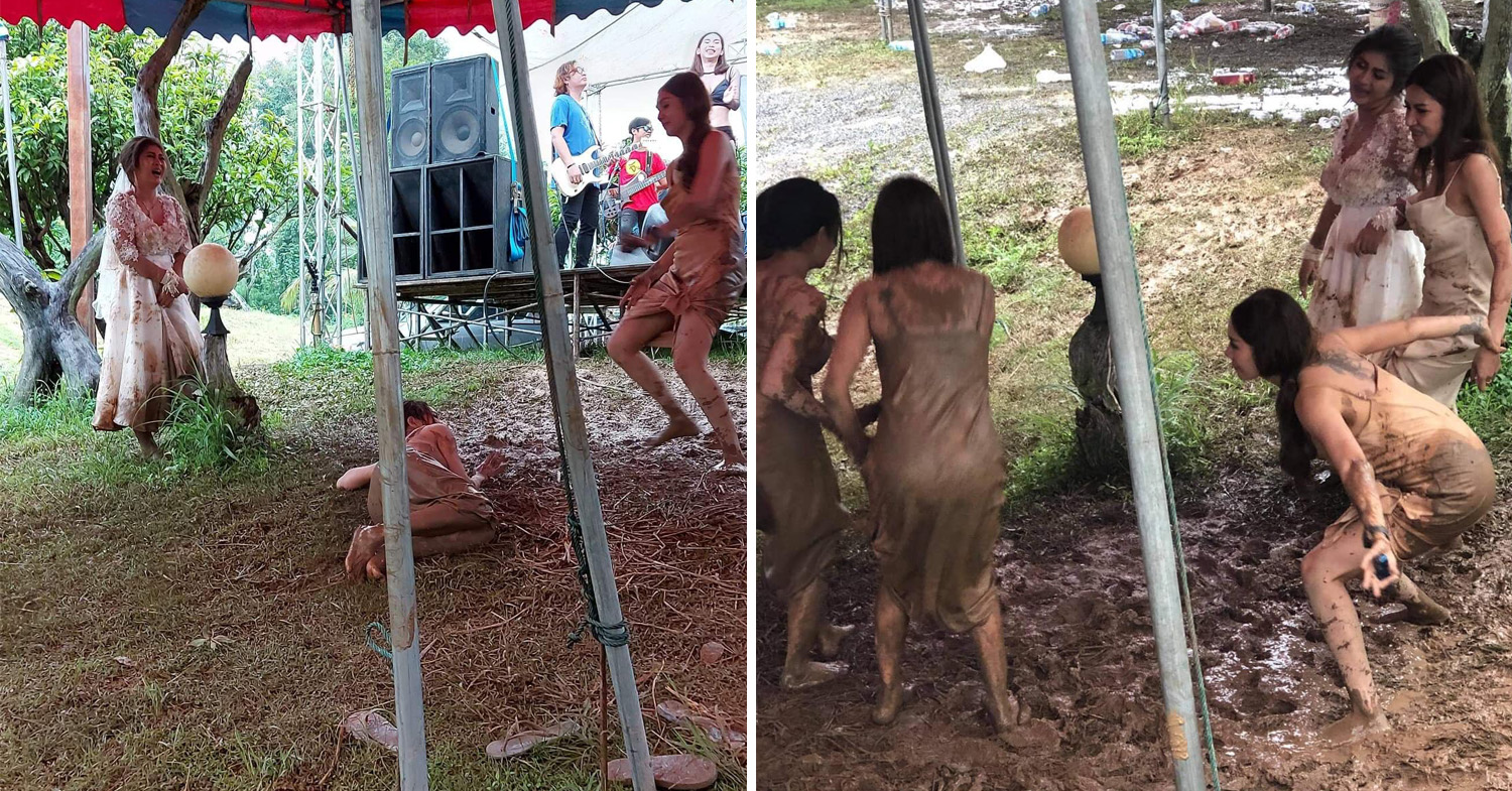 Bridesmaids dance in mud