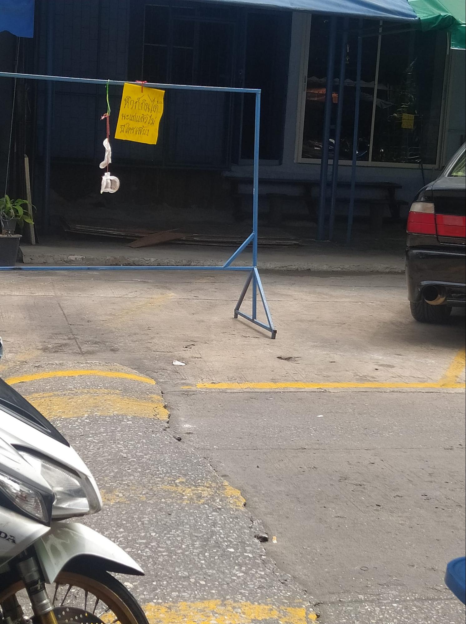 Woman Throws Clothesline With Used Sanitary Napkin At Another Car To Defend Parking Space