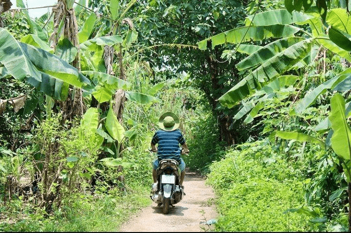 places to cycle in Hanoi - banana island motorbike
