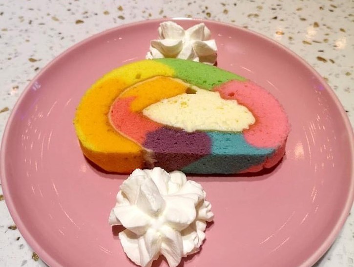 pride cafe saigon - rainbow cake with some cream