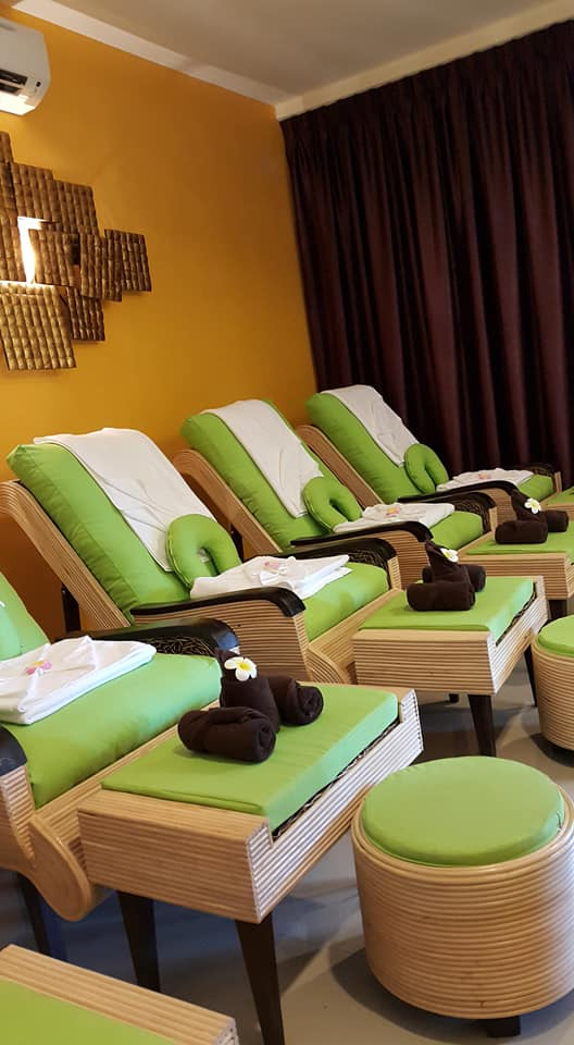 Row of massage chairs at Ancient Thai Herbal Spa & Beauty