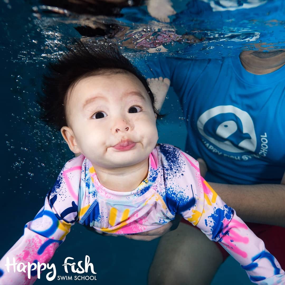 cheap affordable baby kids enrichment classes happy fish swimming babies 