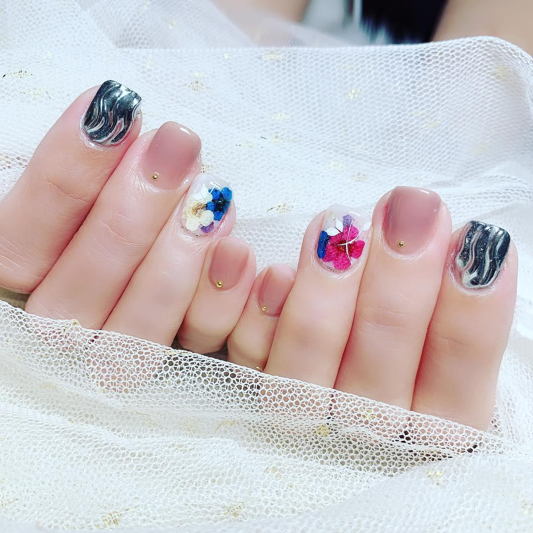 Mix and match floral patterns at Tiff's Nails