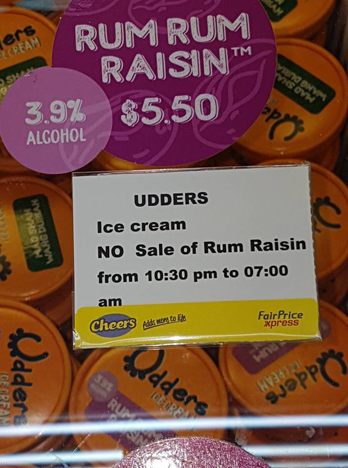 backpacking in singapore - no sale of rum raisin ice cream sign