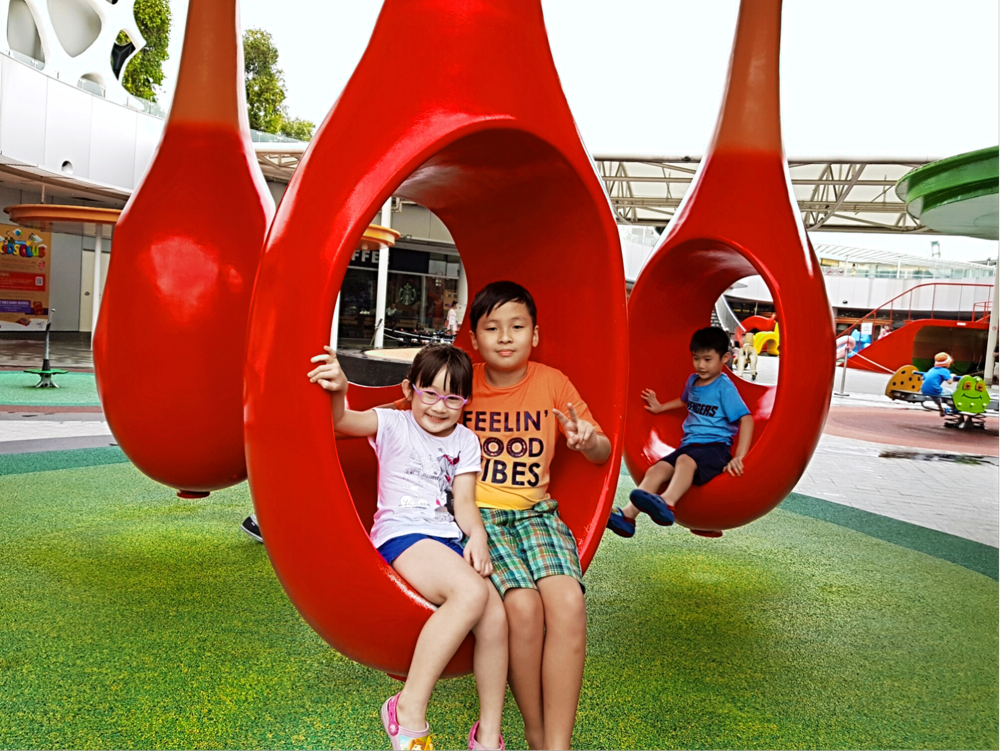 free playgrounds in mall - vivocity hanging spoon shaped pods