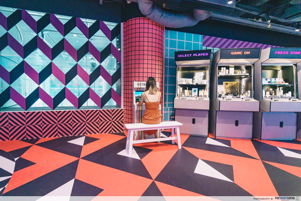 NomadX Has New Themed Pop-Ups Like Arcade Machines & A Beauty Bar That Let You Buy Exclusive Online Brands retrocade booth