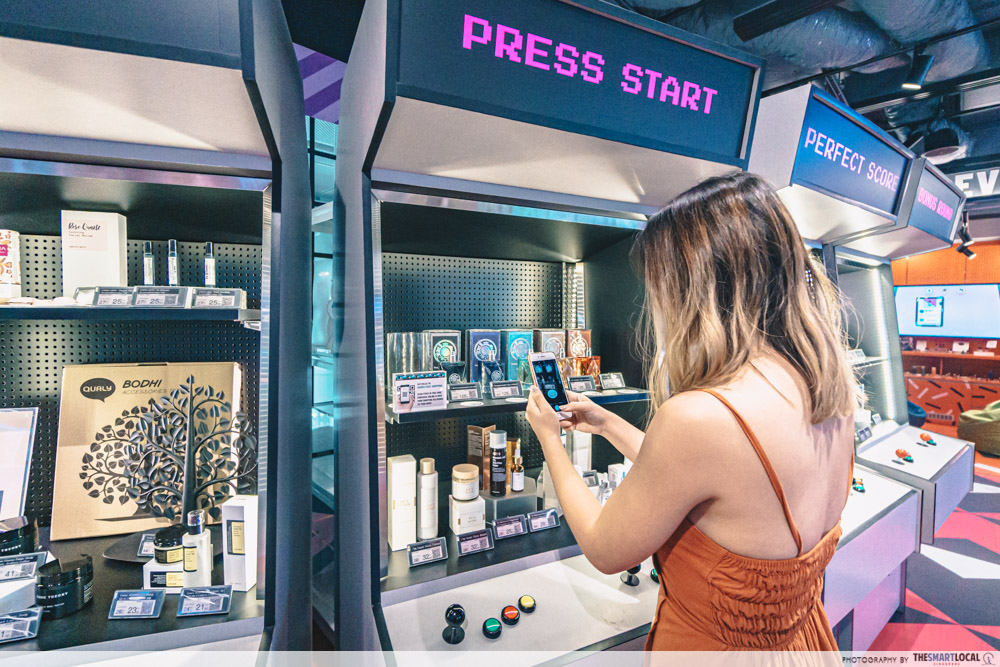 NomadX Has New Themed Pop-Ups Like Arcade Machines & A Beauty Bar That Let You Buy Exclusive Online Brands arcade machine