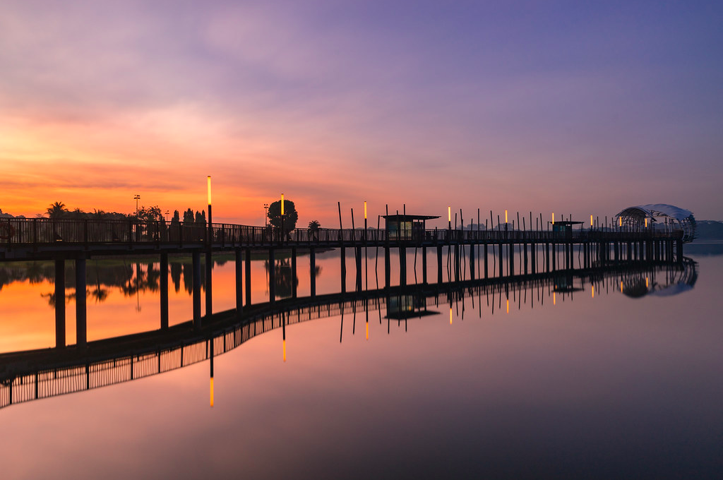 sunrise and sunset in singapore - lower seletar reservoir park heritage bridge