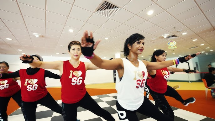 Singaporeans workout in red and white 