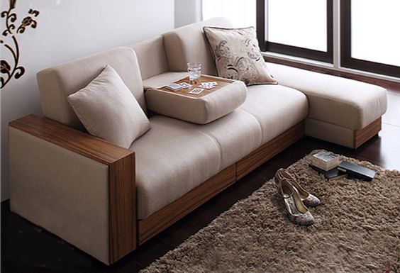 Sarai storage bed has a pull-down coffee table function