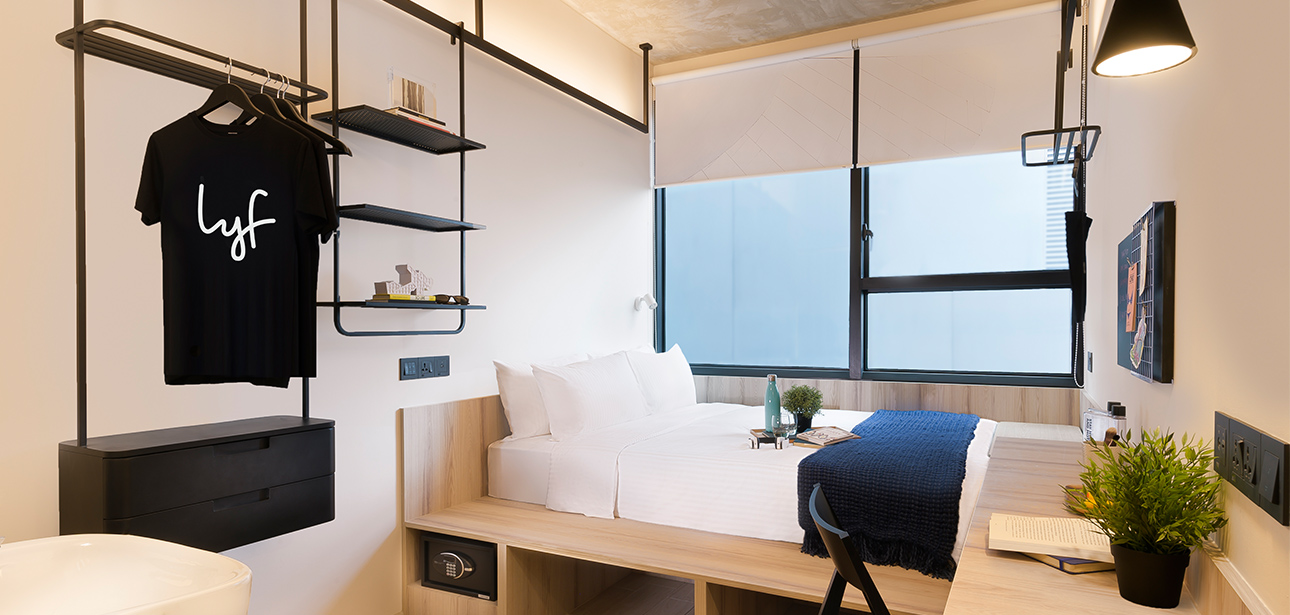 cheap hotel singapore 2020 - lyf funan interior room, bed and wardrobe